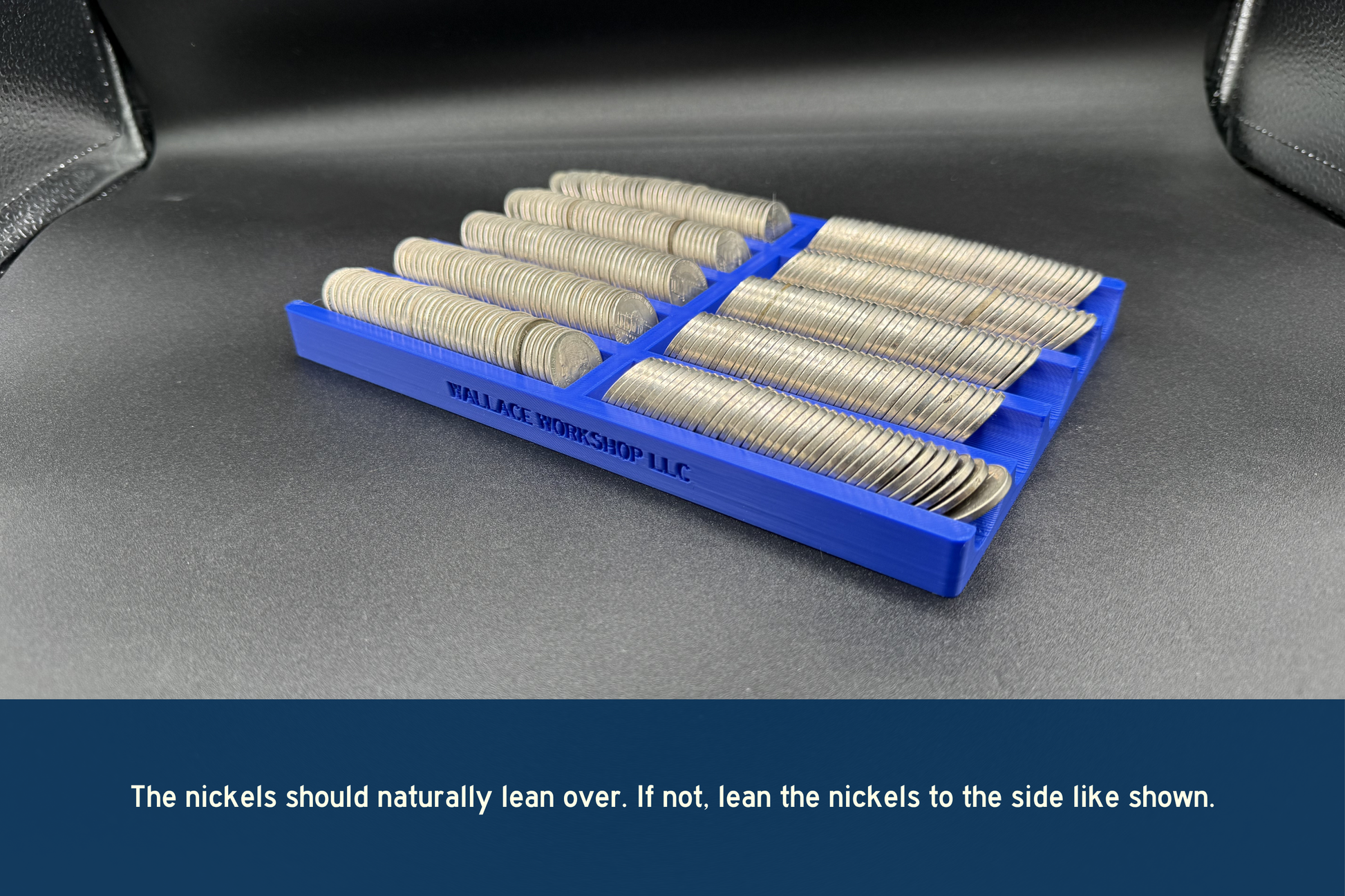 Set of nickels in a blue holder on a dark surface